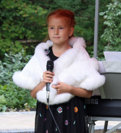 6 year old Eva  singing in the Russian Cultural Garden